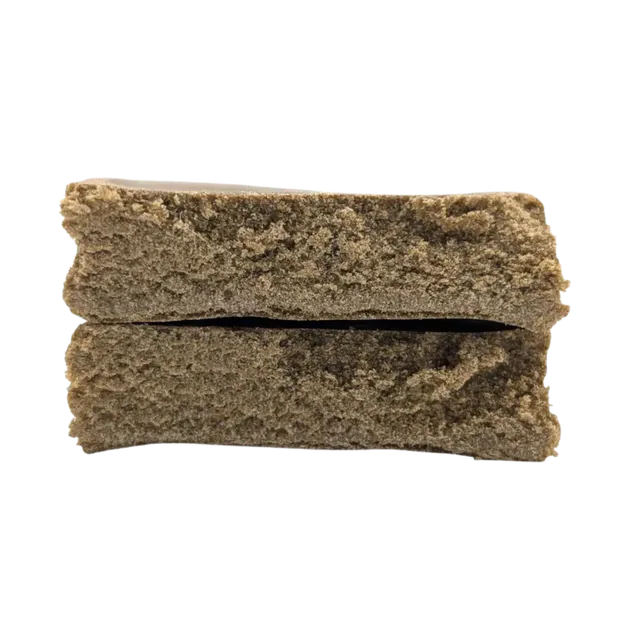 West Coast Static hash med 50 % THCA-B från Lyfted: pressade gråbruna block med kornig yta